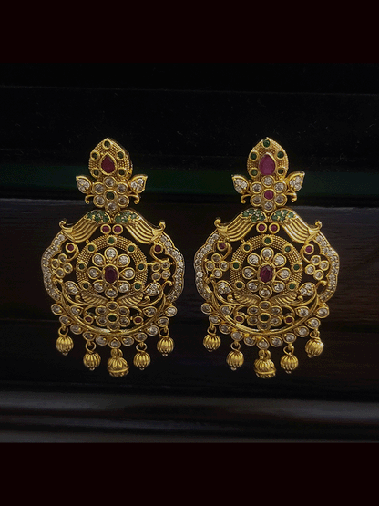 Ruby,polki and green stones studded peacock motif's intricate design set