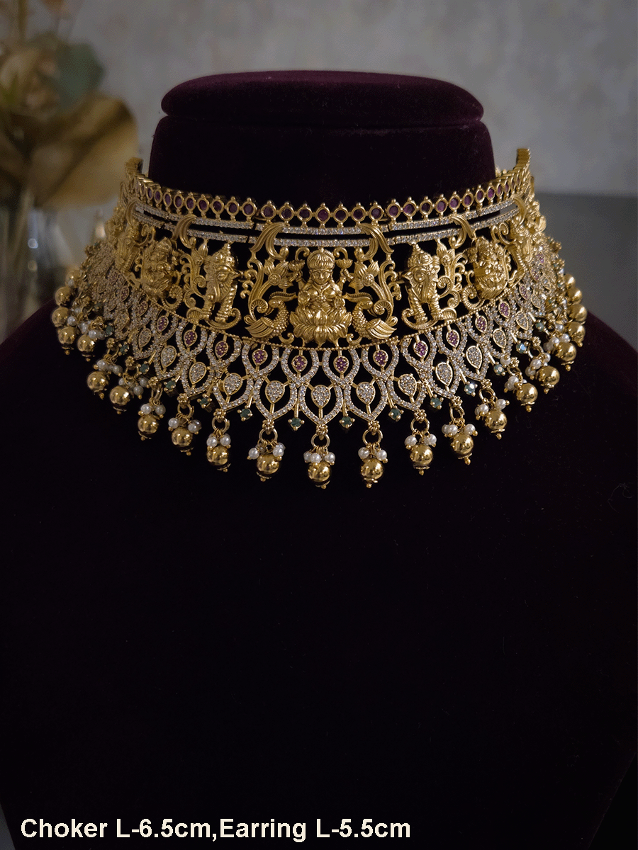 Laxmiji and Ganpatiji motif's zircon studded choker with peacock design