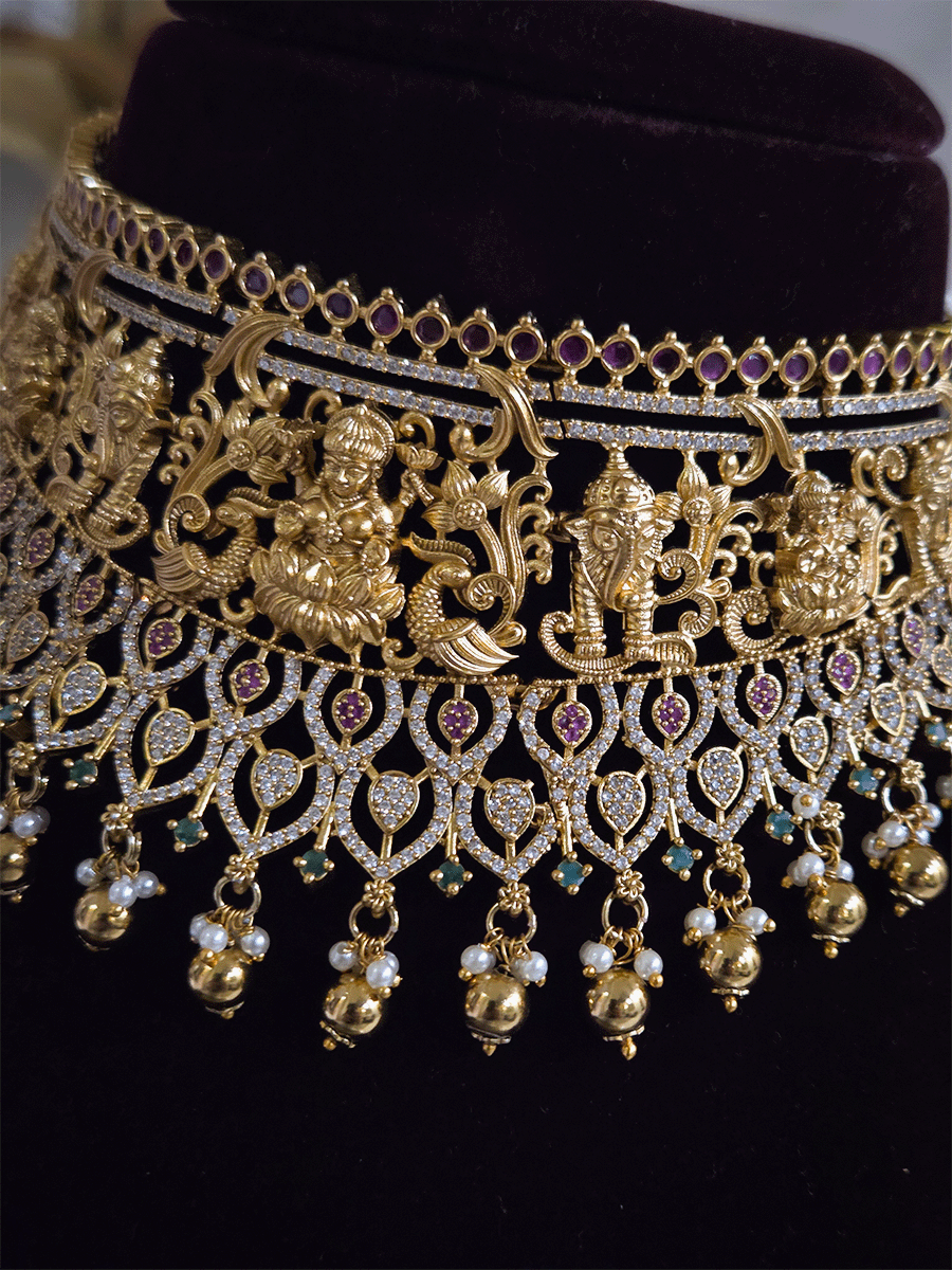 Laxmiji and Ganpatiji motif's zircon studded choker with peacock design