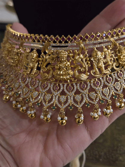 Laxmiji and Ganpatiji motif's zircon studded choker with peacock design