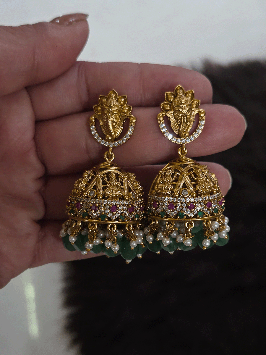 Laxmiji and Ganpatiji motif's zircon studded choker with peacock design