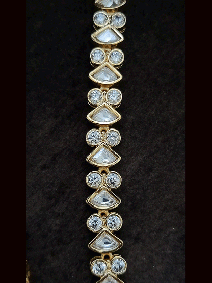 Triangular uncut polki with AD detailing classy set