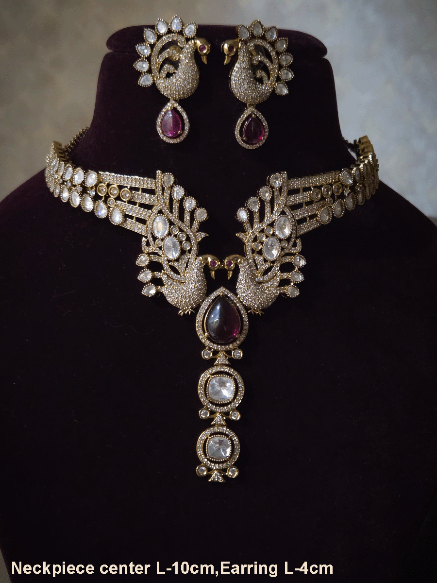 Tear shaped white stone with peacock on both sides mehendi finish moissanite set