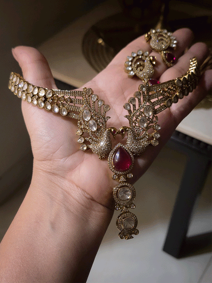 Tear shaped white stone with peacock on both sides mehendi finish moissanite set
