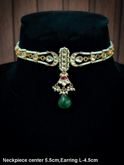 Paachi kundan long tukdi in center set with green drop and side leaf shaped kundan string