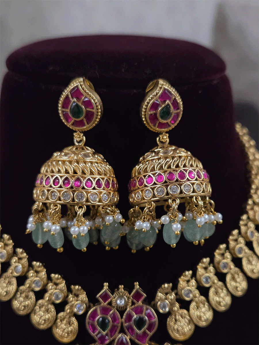 Laxmiji coin side string with ruby green paachi kundan aqua drops pendant set