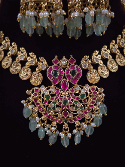 Laxmiji coin side string with ruby green paachi kundan aqua drops pendant set