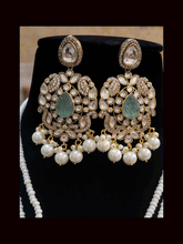 Load image into Gallery viewer, Five pearl strings kundan and AD studded set with tear drop shaped stone in the center