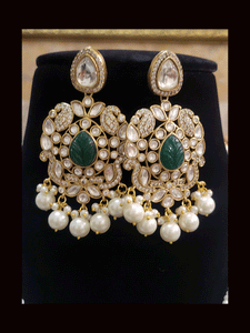 Five pearl strings kundan and AD studded set with tear drop shaped stone in the center