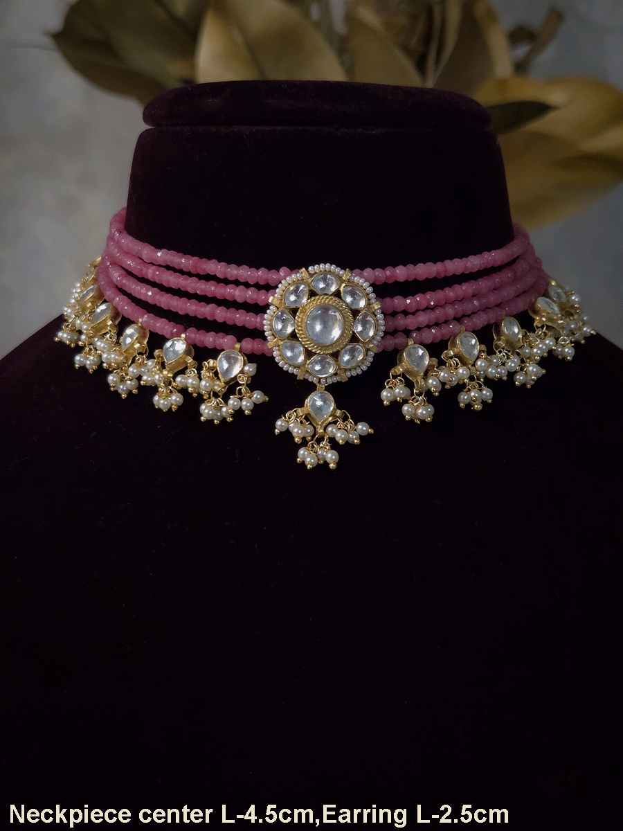 Four peach strings set with center kundan flower with pirohi and hanging kundan drops
