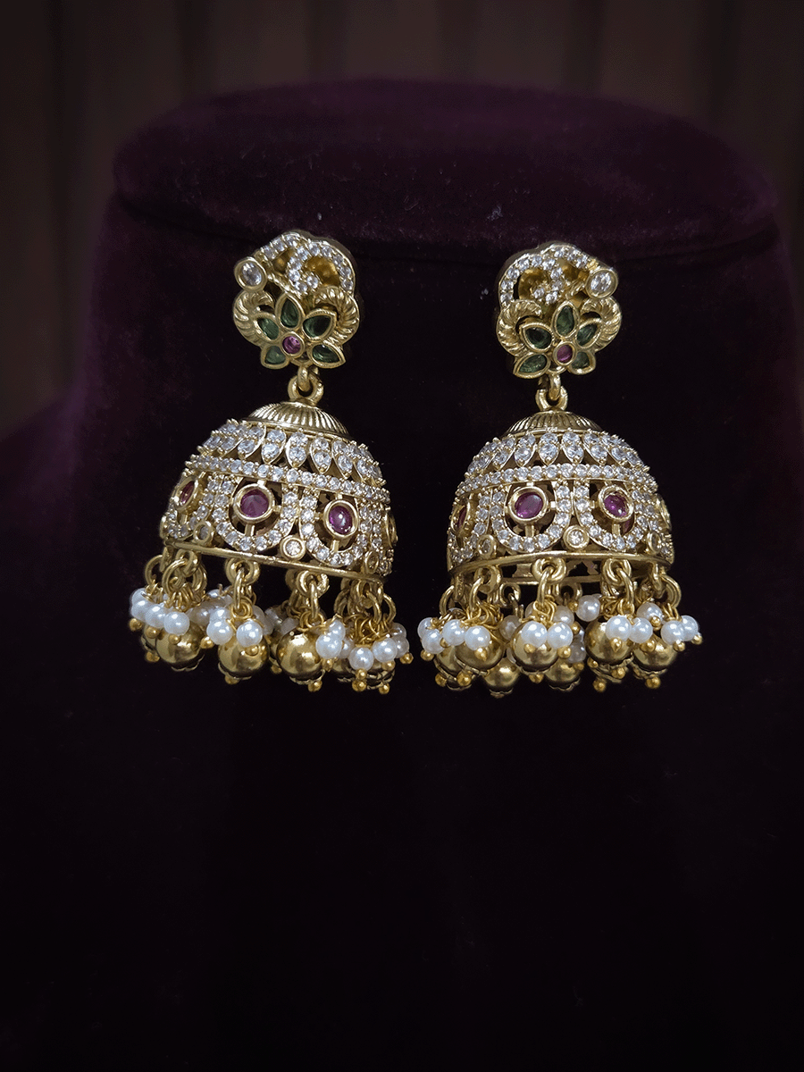 Zircon studded peacock and elephant motif's broad choker set with coloured drops