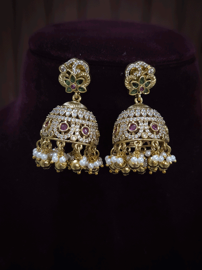 Zircon studded peacock and elephant motif's broad choker set with coloured drops