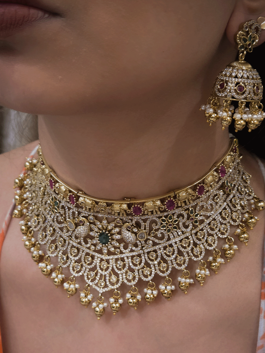 Zircon studded peacock and elephant motif's broad choker set with coloured drops