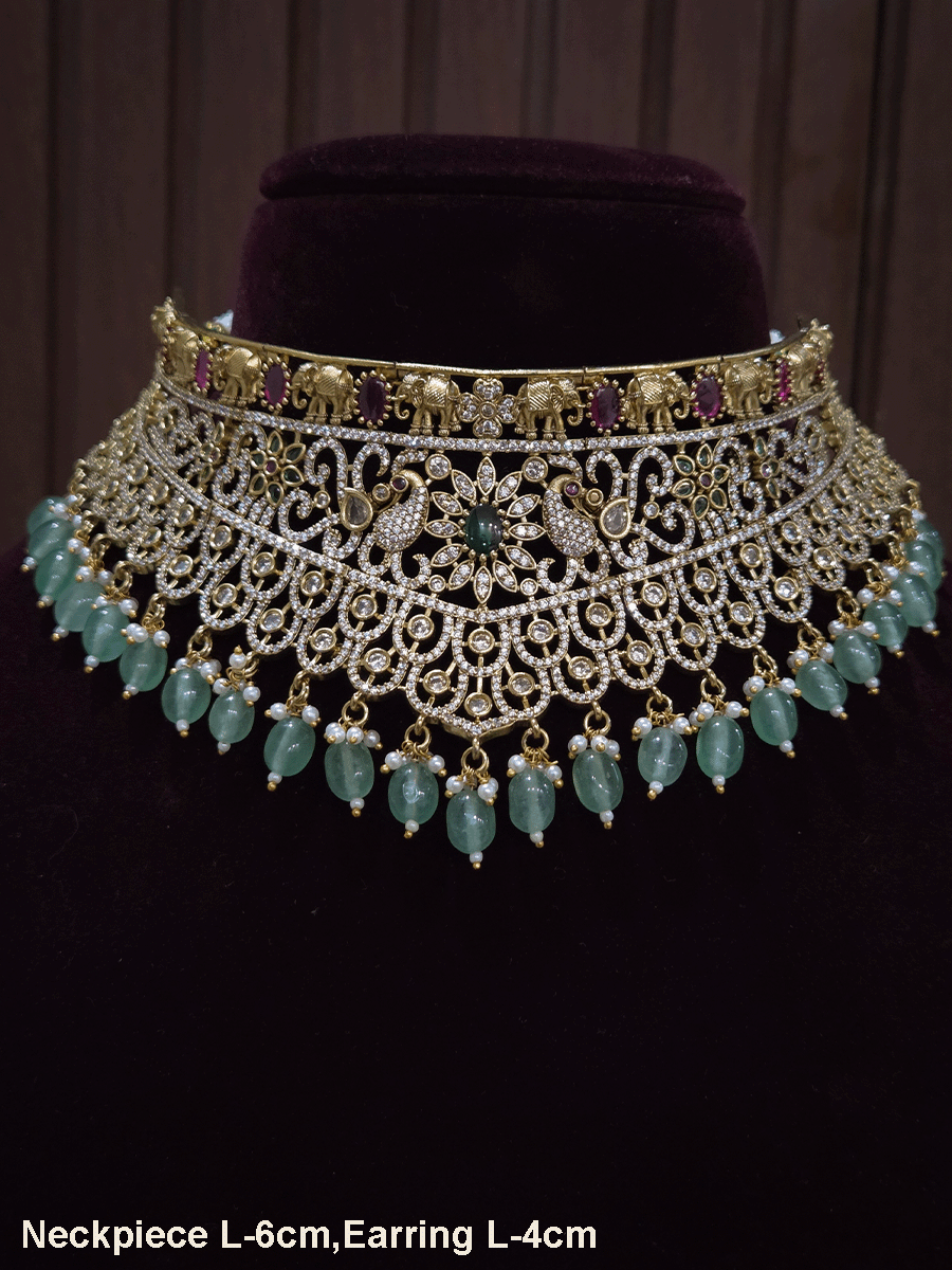 Zircon studded peacock and elephant motif's broad choker set with coloured drops