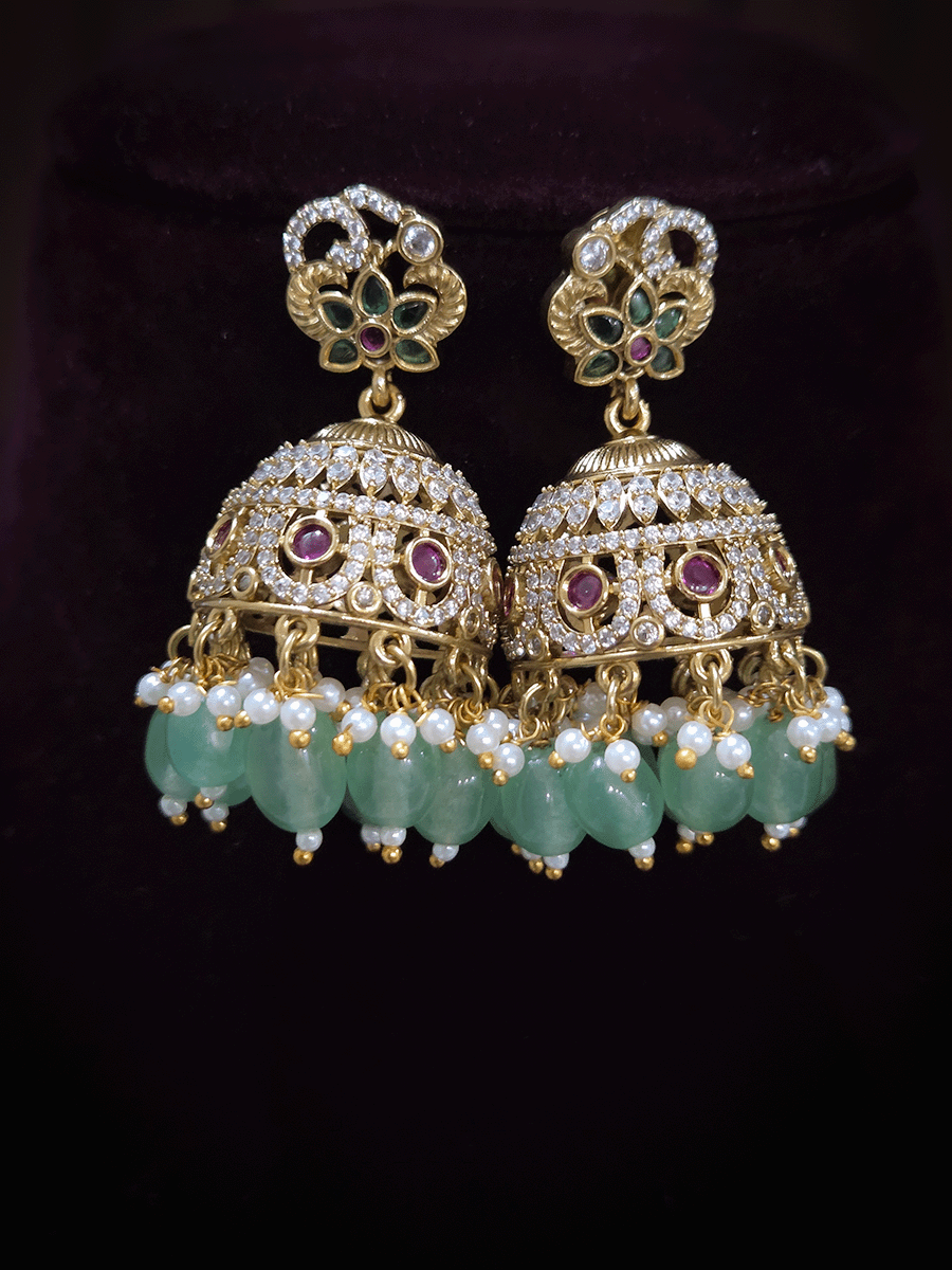 Zircon studded peacock and elephant motif's broad choker set with coloured drops