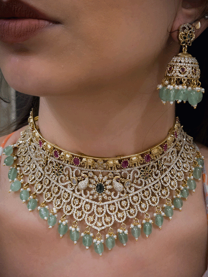 Zircon studded peacock and elephant motif's broad choker set with coloured drops