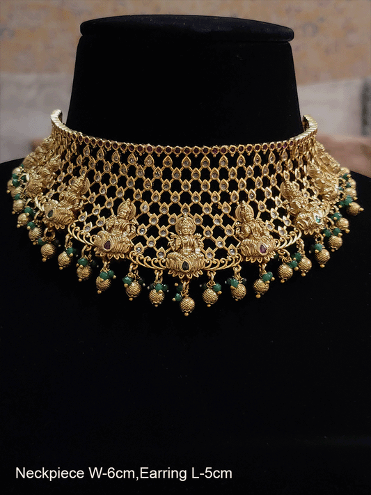 Laxmiji motif's on mesh polki design set with gold and green bead drops