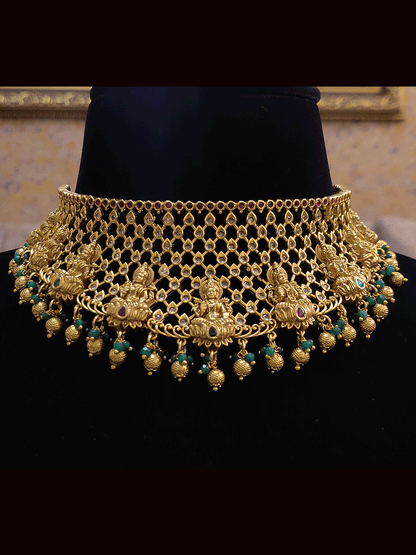 Laxmiji motif's on mesh polki design set with gold and green bead drops