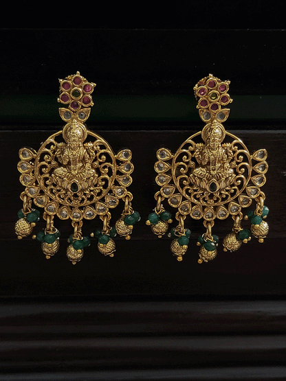 Laxmiji motif's on mesh polki design set with gold and green bead drops