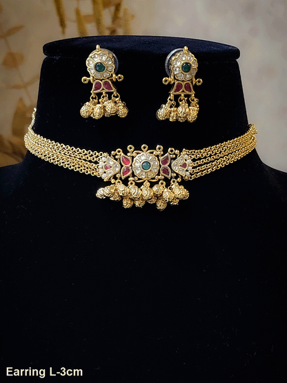 Paachi kundan ruby and green stone center with ghunghru hangings set with four chains string