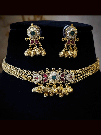 Paachi kundan ruby and green stone center with ghunghru hangings set with four chains string