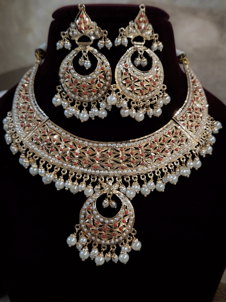 Jadau set with chandbali design center and pearl drops