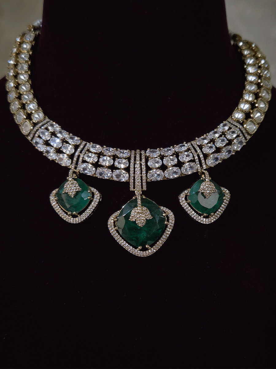 Zircon detailing on three hanging stones tukdies of moissanite set