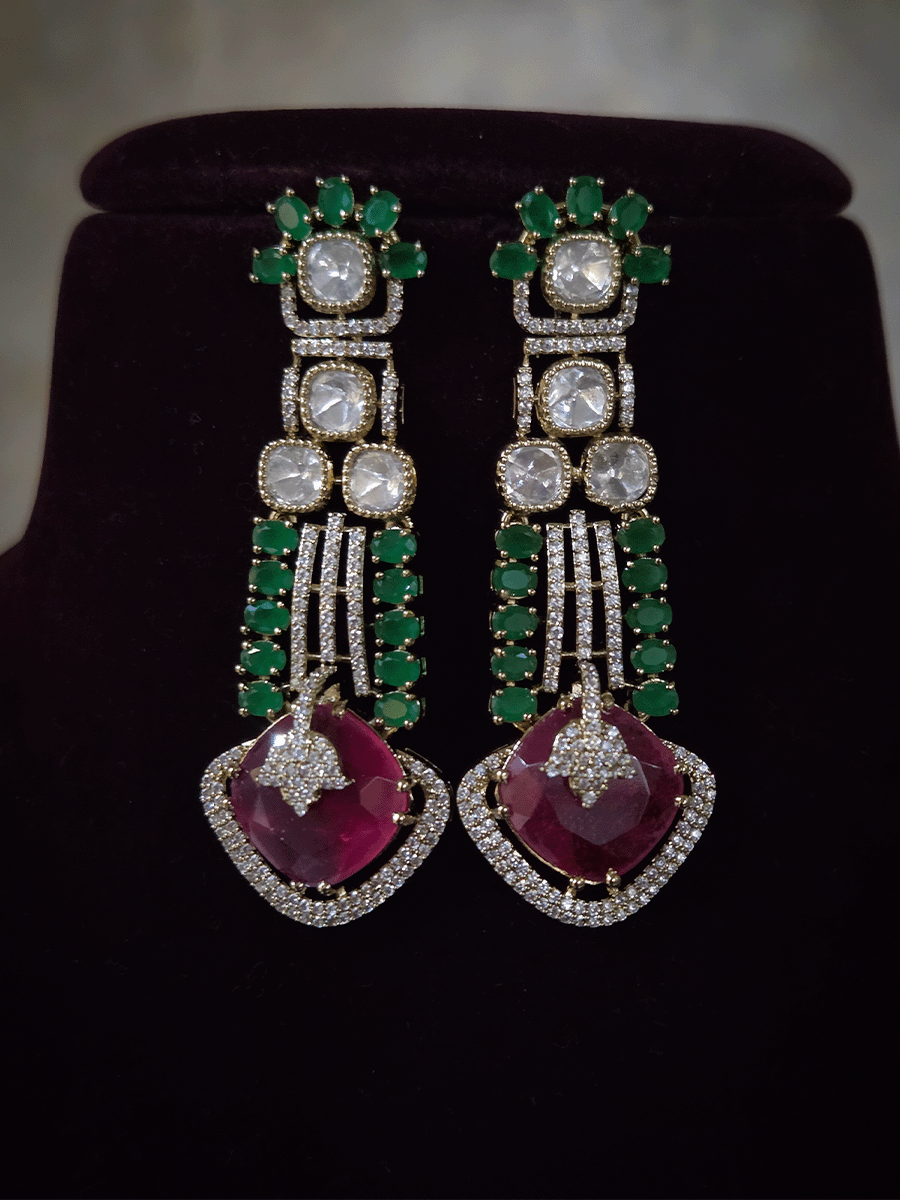 Zircon detailing on three hanging stones tukdies of moissanite set