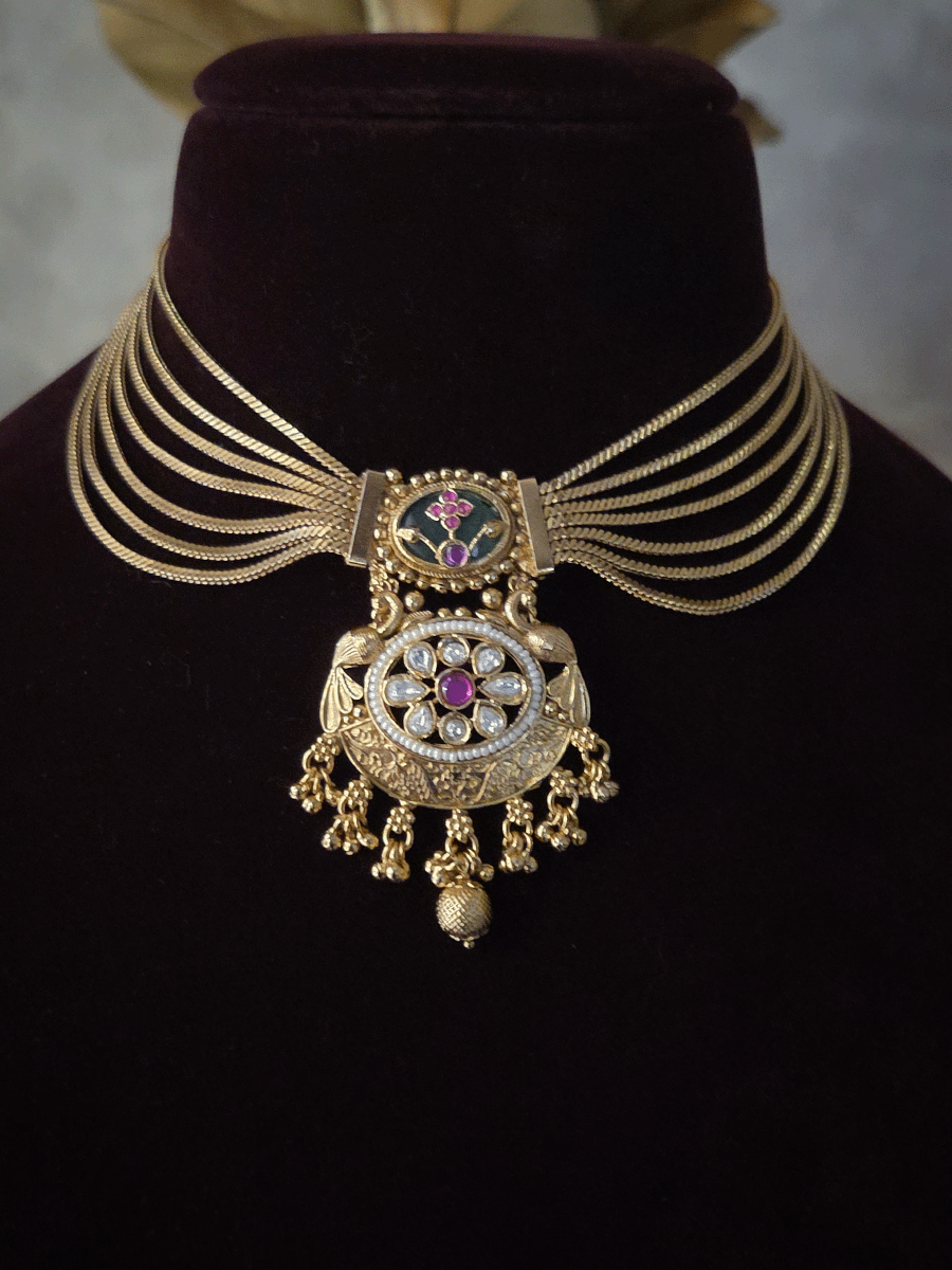 Seven layer gold chain set with kundan flower center pendant and aqua stone with inlay work on top