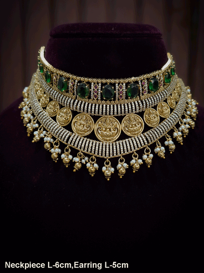 Zircon studded laxmiji motif's broad choker set with oval green stones