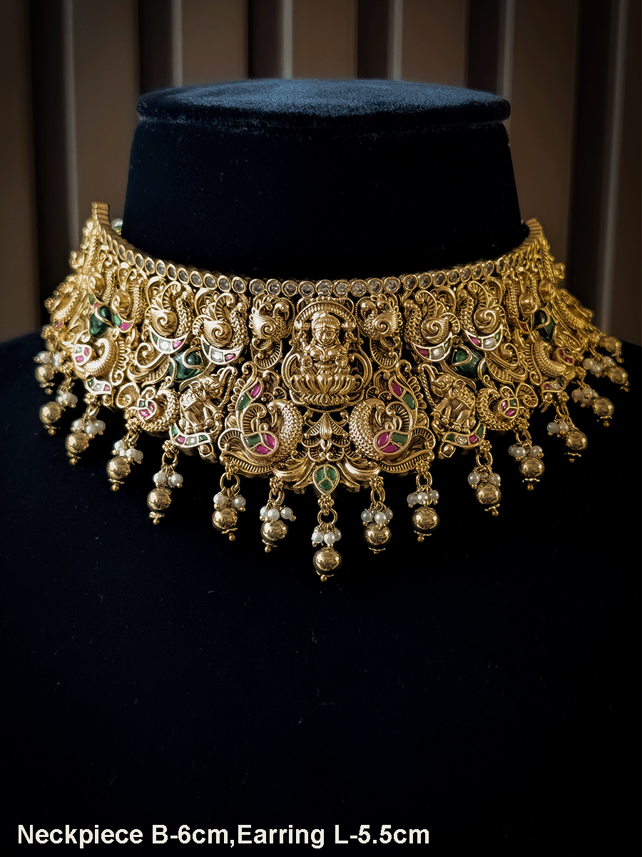 Kundan studded 6cm broad Laxmiji set with elephants and peacocks carving