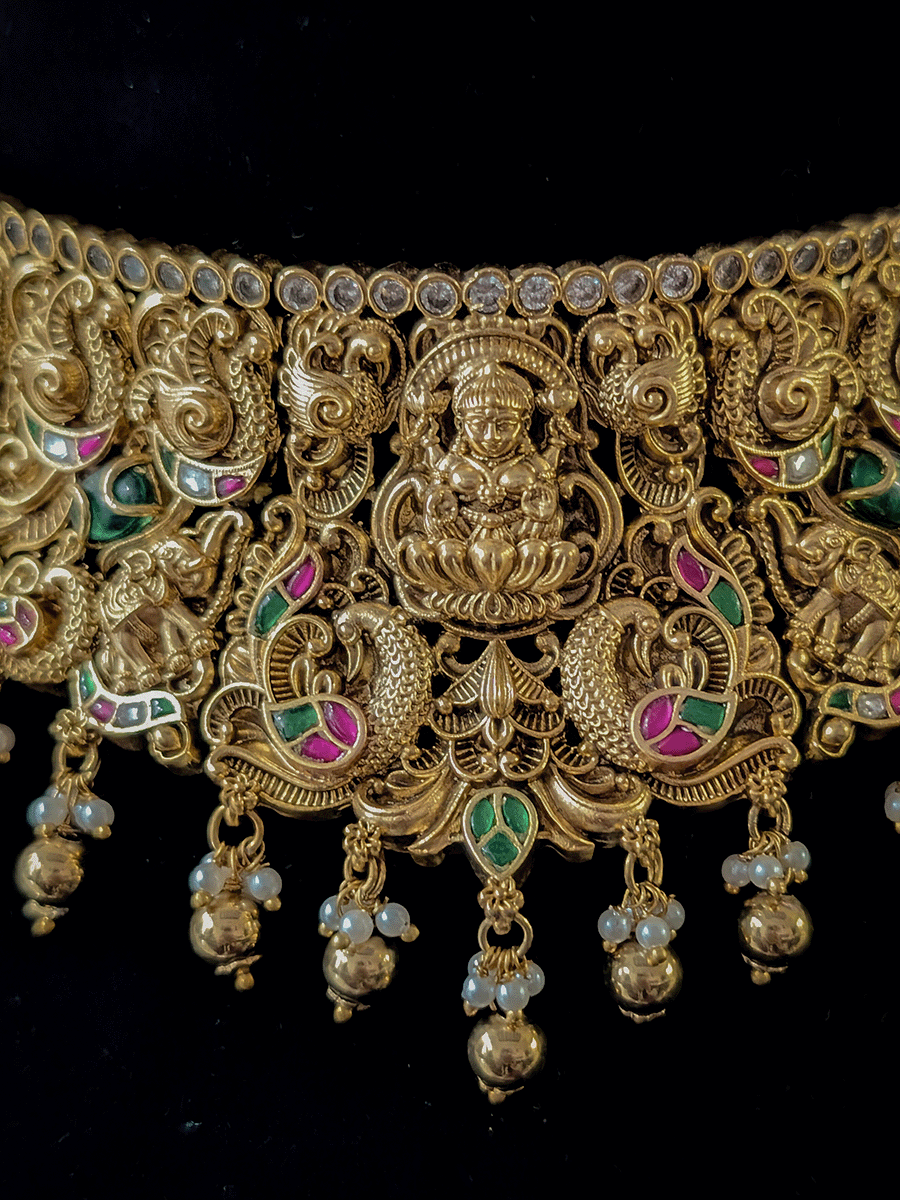 Kundan studded 6cm broad Laxmiji set with elephants and peacocks carving