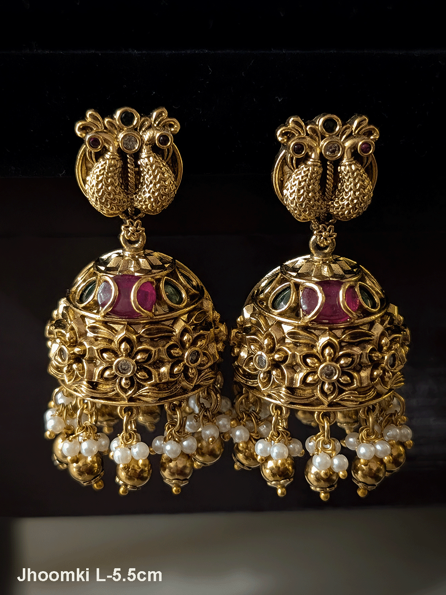 Kundan studded 6cm broad Laxmiji set with elephants and peacocks carving