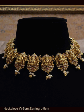 Laxmiji tukdies studded with ruby stones and zircons and pearly hangings set