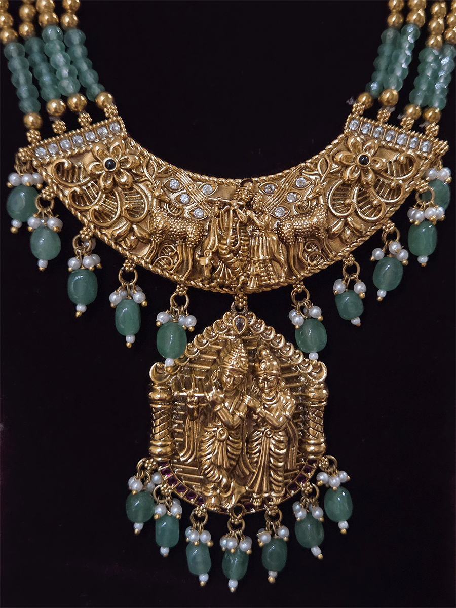 Radha Krishna 9cm broad and long pendant set with side deers and flower design in aqua bead strings