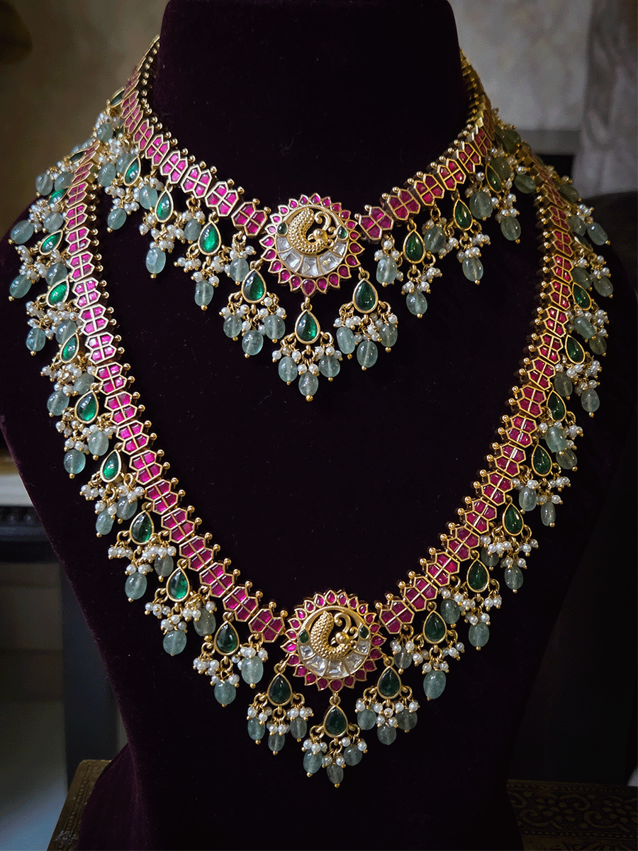 Peacock design center with green tear drop hangings and aqua bead drops paachi kundan set