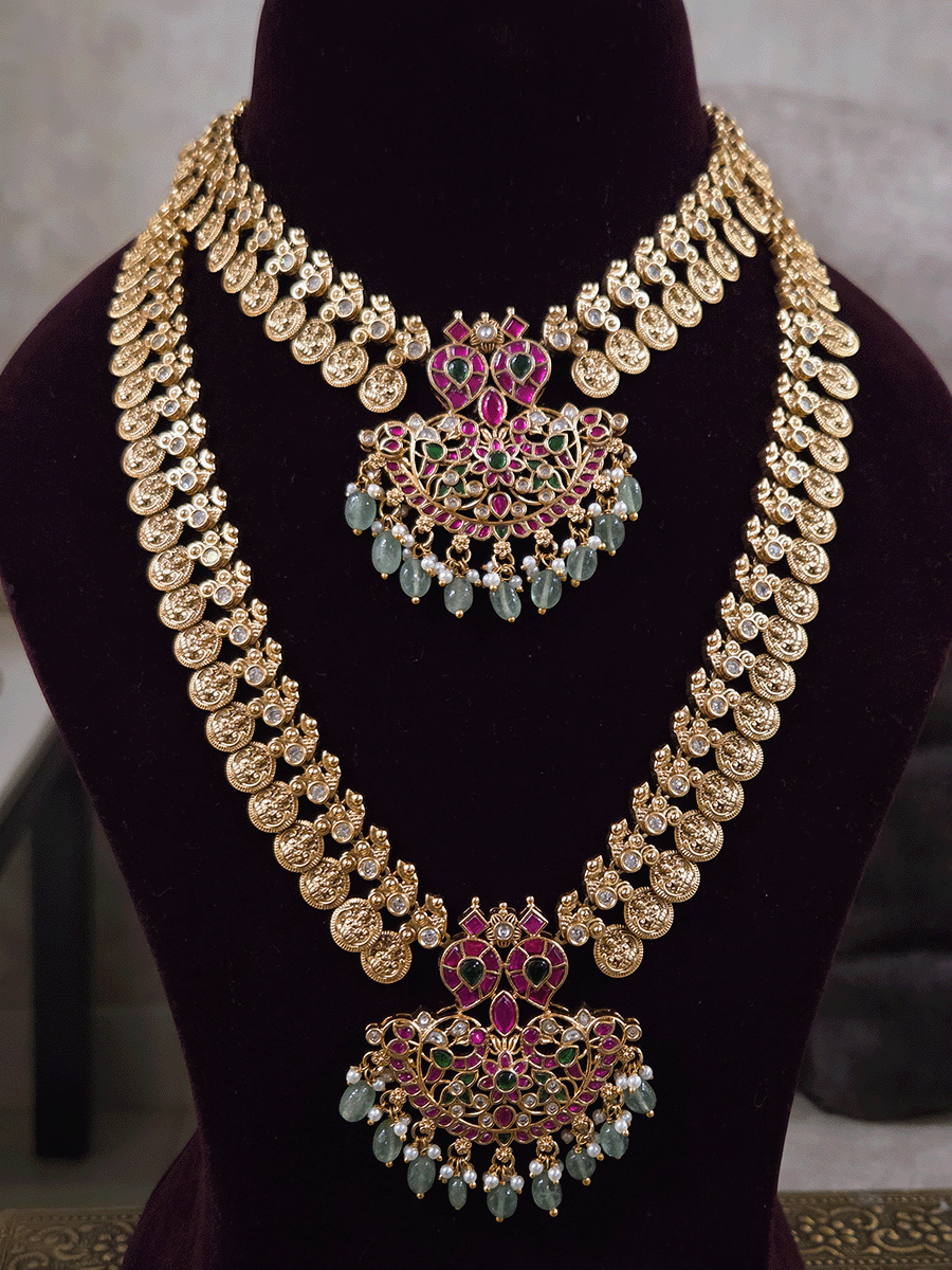Laxmiji coin side string with ruby green paachi kundan aqua drops pendant set