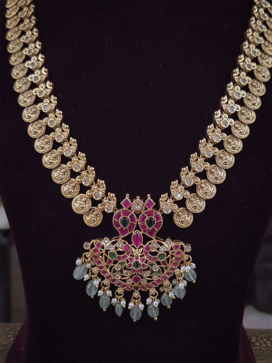 Laxmiji coin side string with ruby green paachi kundan aqua drops pendant set