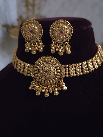 Circular flower center with ruby stone chik set with broad chain