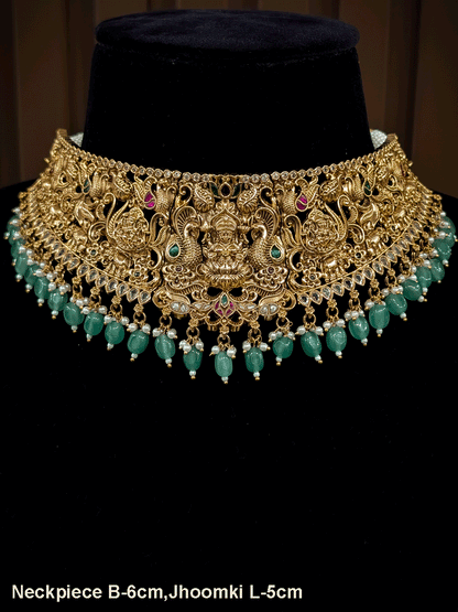 6cm broad kundan and polki studded laxmiji set with peacock design on both sides and jade bead drops