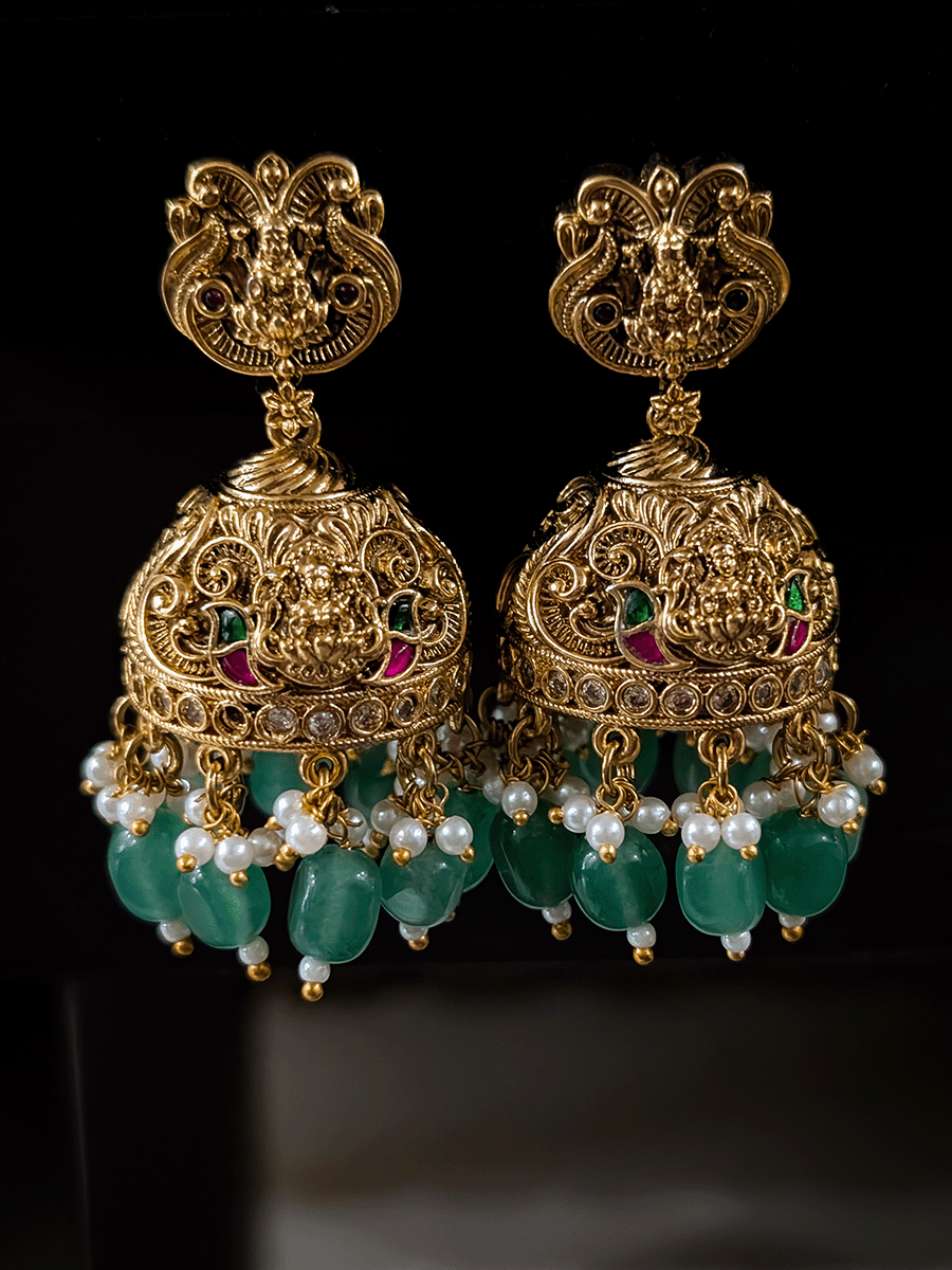 6cm broad kundan and polki studded laxmiji set with peacock design on both sides and jade bead drops