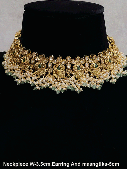 Intricate design antique gold finish kundan and stones studded pearly frill set