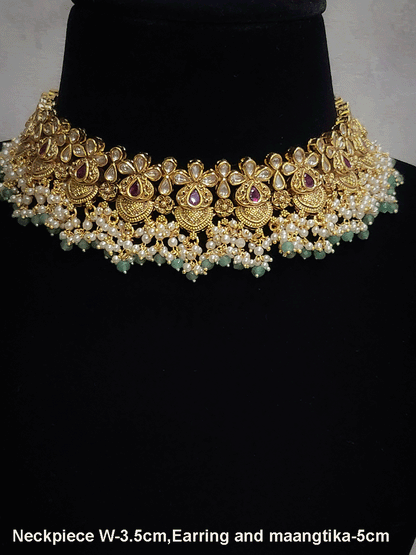 Intricate design antique gold finish kundan and stones studded pearly frill set