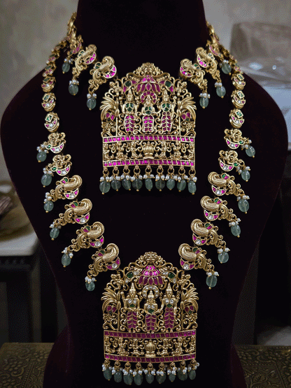 Pink and green stones studded Ram durbar with peacock side string aqua bead drops paachi kundan set