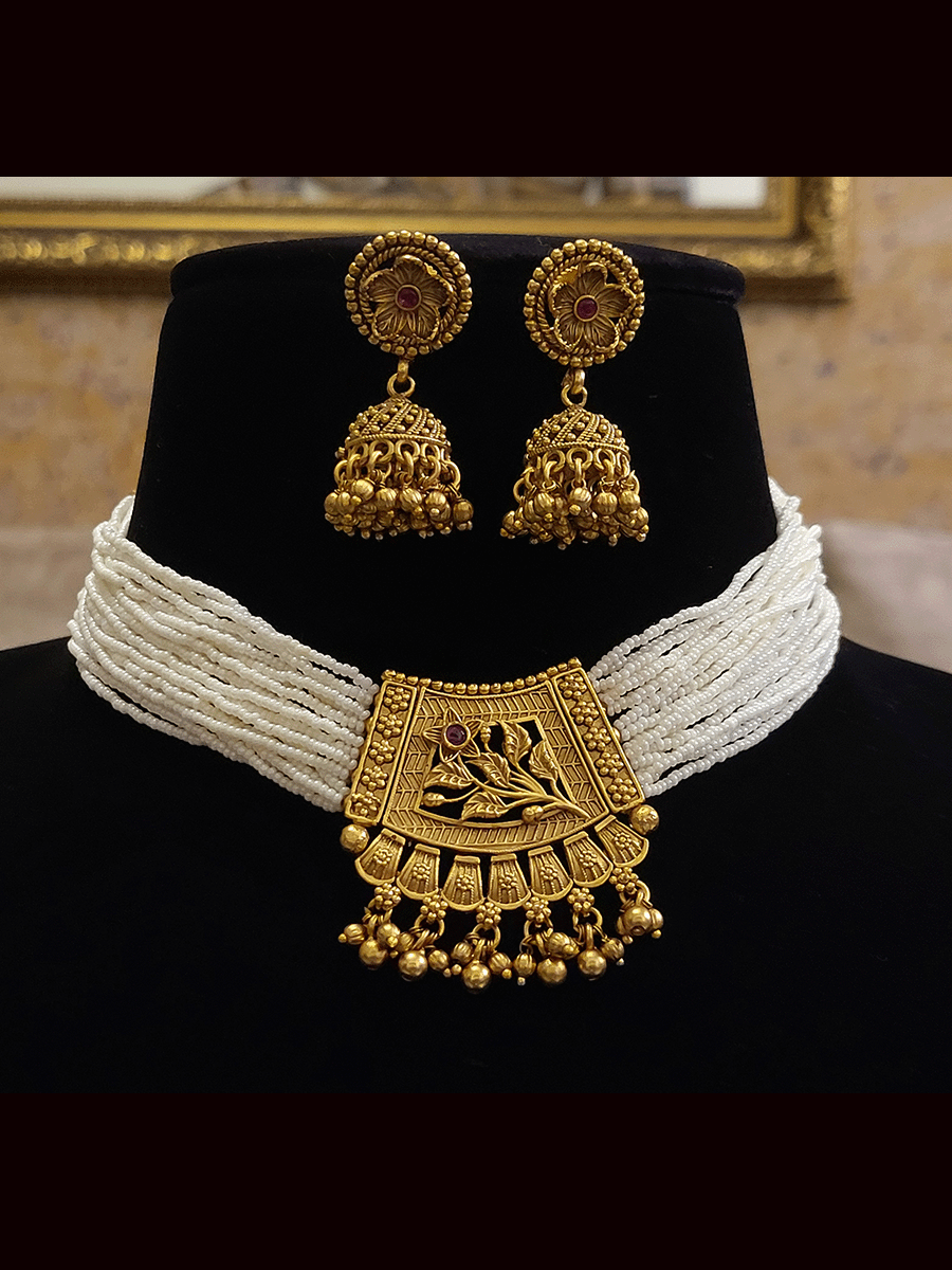Traditional design center side cheed strings neckpiece with jhoomki earrings