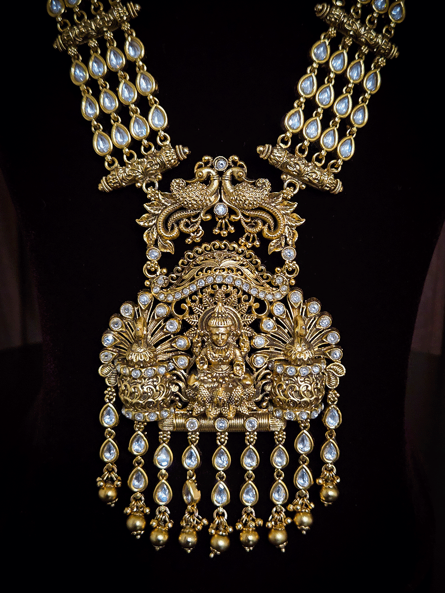 Kundan studded laxmiji with peacock on sides long pendant set with 2cm broad kundan string