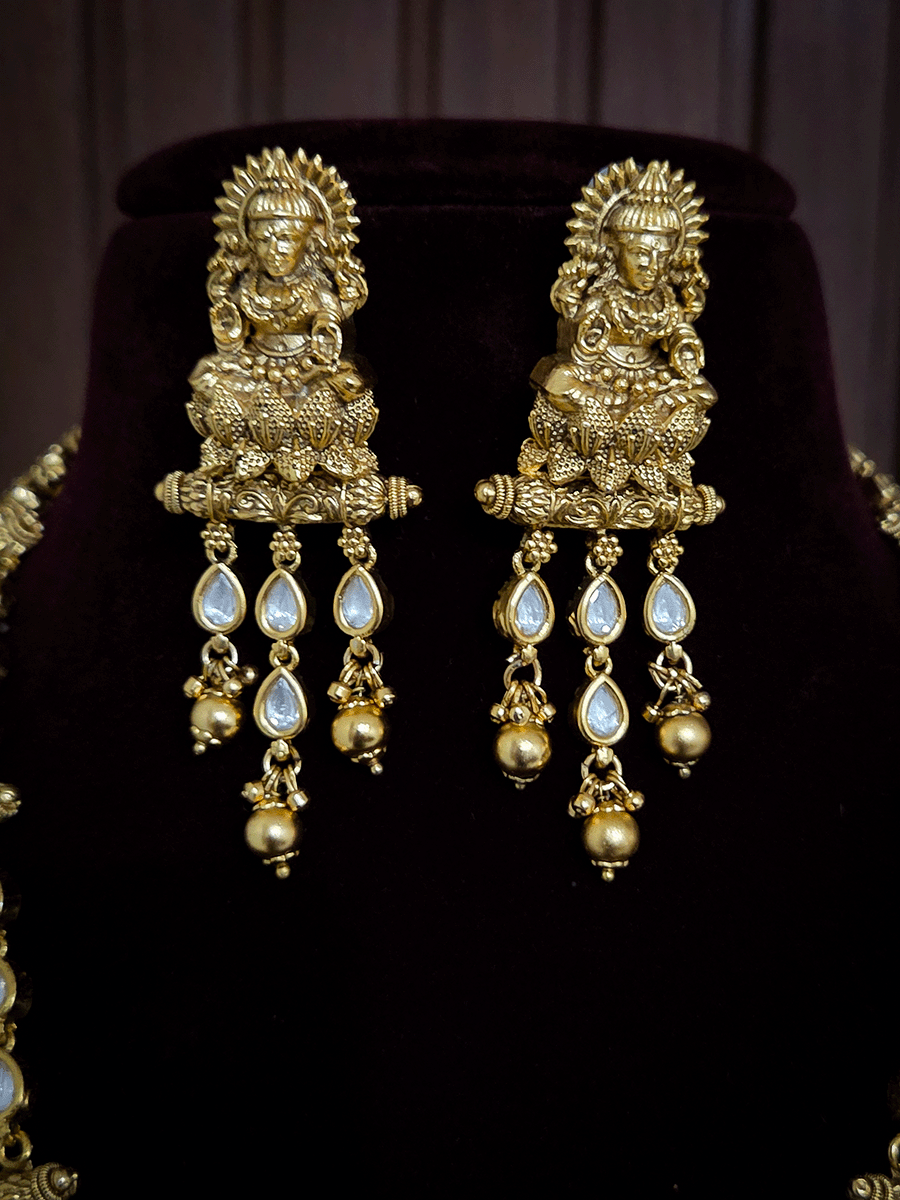 Kundan studded laxmiji with peacock on sides long pendant set with 2cm broad kundan string
