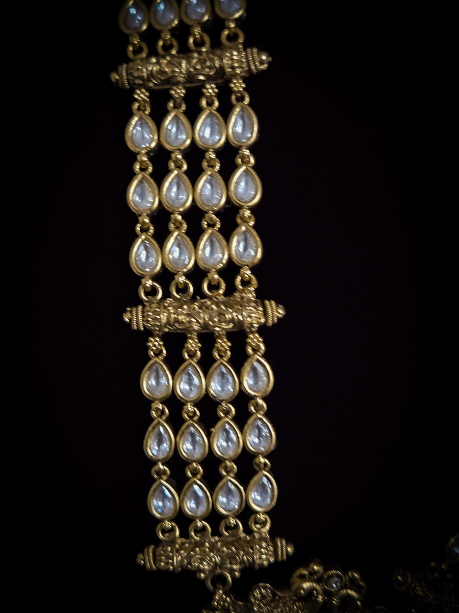 Kundan studded laxmiji with peacock on sides long pendant set with 2cm broad kundan string