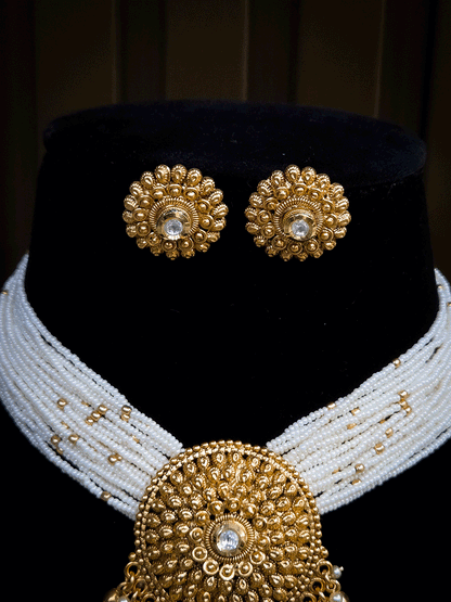 Kundan center circular tukdi side cheed strings set
