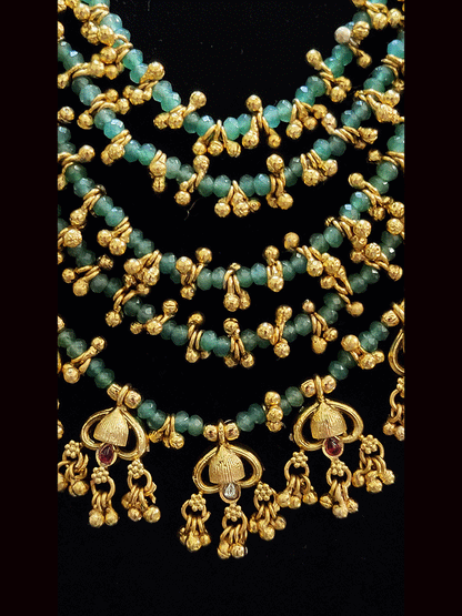 11" long Aqua bead multiple strings with ghunghru detailing and rectangular kundan tukdies in cheed strings set